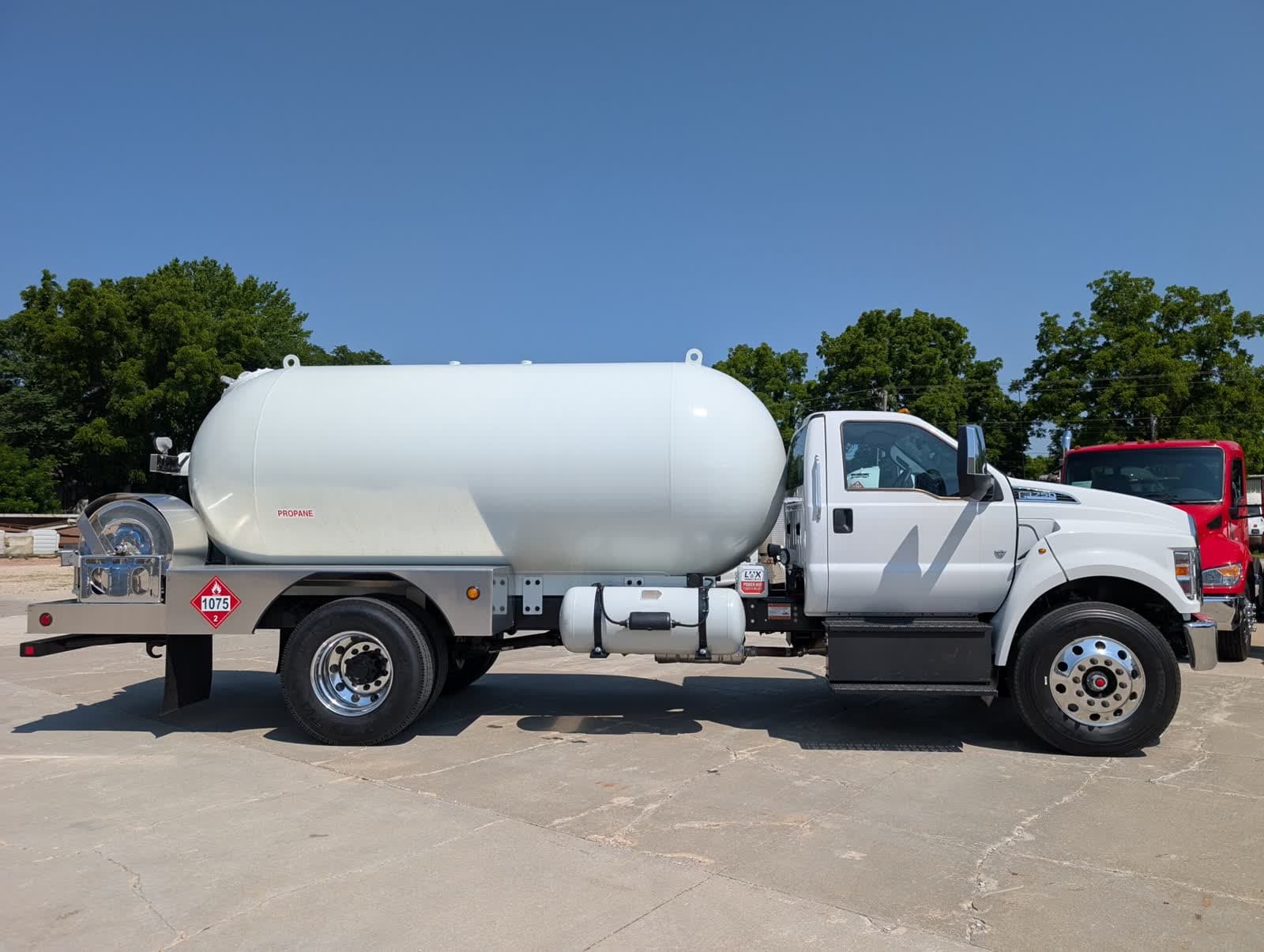 Lux Industries all-white custom propane bobtail, side view